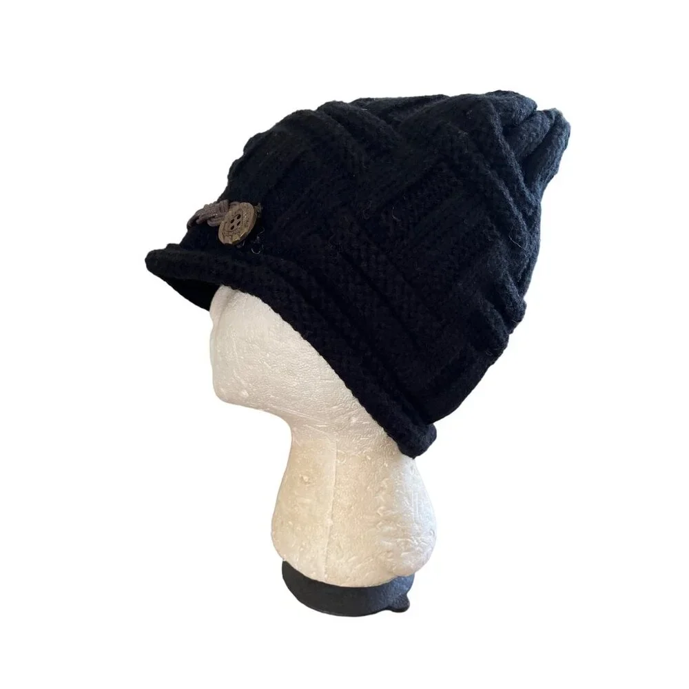 Black beenie toboggan hat with brown beading and buttons in front